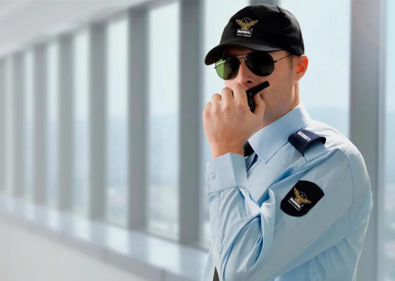 Security Guard Standing in UAE Providing Security Services as top security company employee